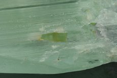 Hiddenite Crystal with Tourmaline Crystals