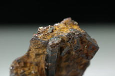 3 Lustrous partly Terminated Painite Crystal in Matrix