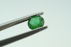 Emerald Green Kornerupine faceted & rough