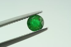 Emerald Green Kornerupine faceted & rough