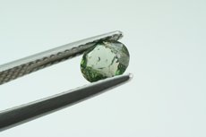 Green Kornerupine faceted & rough