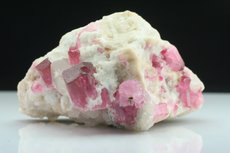 Pinkfarbige Turmaline Kristalle in Matrix