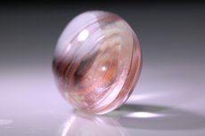 Topas Cabochon mit Einschlüssen