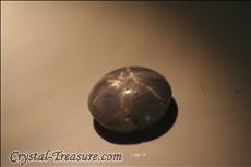 Hexagonal striped Sapphire Cabochon with fine Star