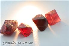 Various shaped red Spinel crystals