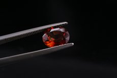 Oval Cut orangey Zircon