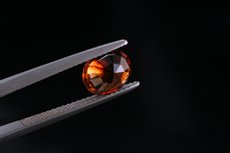 Oval Cut orangey Zircon