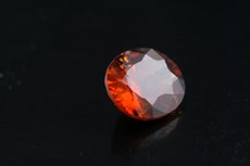 Oval Cut orangey Zircon