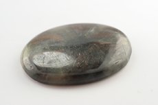 Bronzefarbiger Trapiche Saphir Cabochon