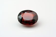 Facetted deep orangey red Spinel 