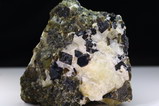 Black Spinel (Herzynite) on Olivin and Calcite Matrix